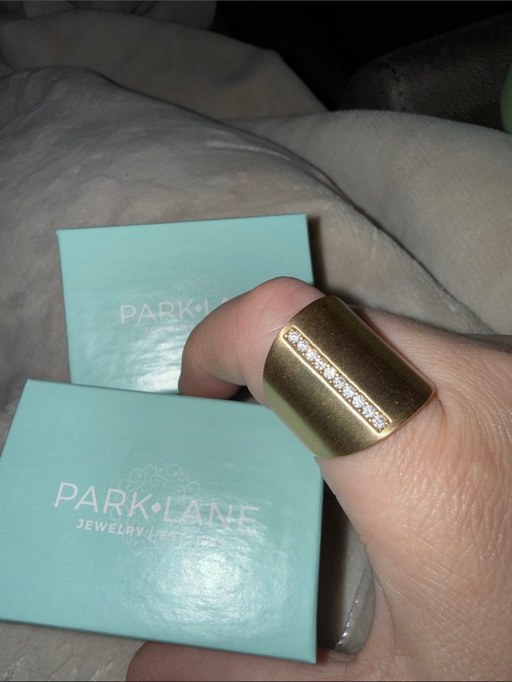Park Lane Gold Wide Band Ring with Row of Crystals